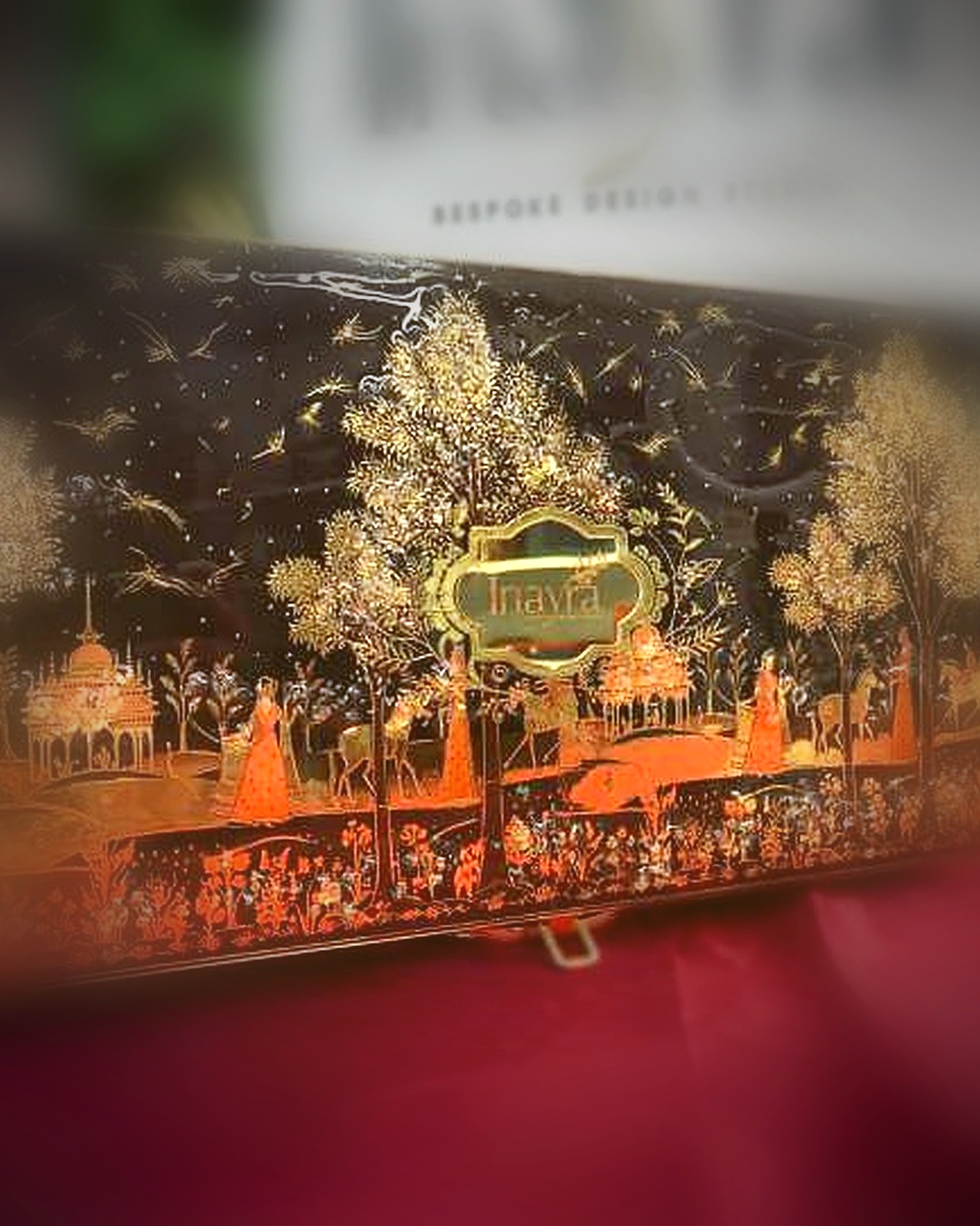 Inayra luxury handcrafted gift box with silk ribbon and gold detailing